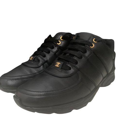 Chanel triple best sale black sneakers